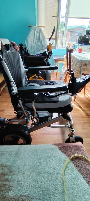 Cărucior electric pentru persoane cu dizabilități