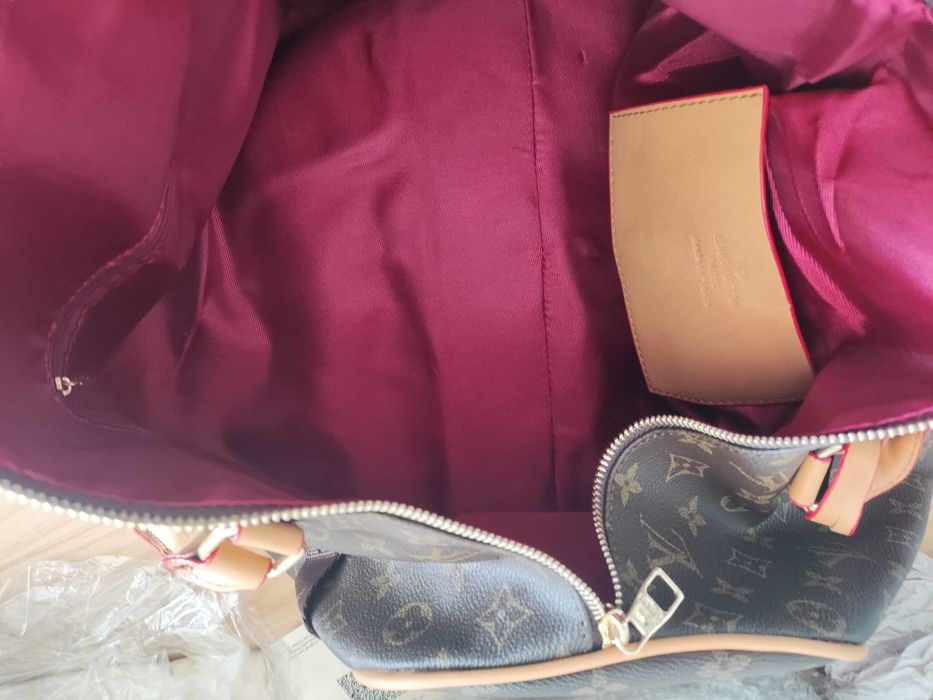 In stoc voiaj, geanta sport piele Louis Vuitton 1109.7