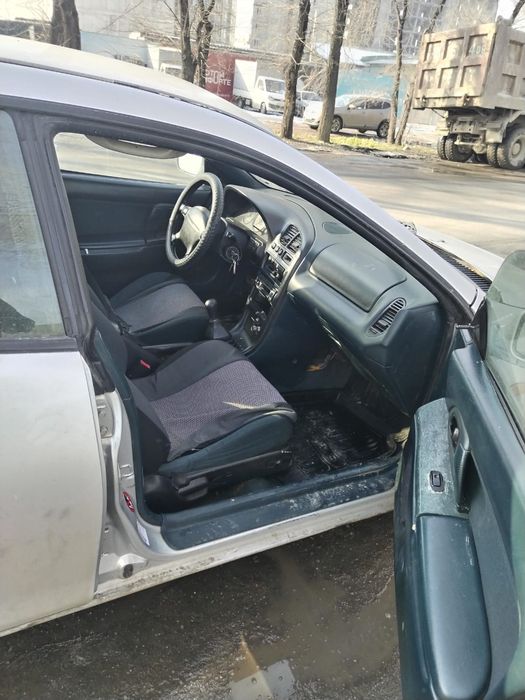 Продам Мазду 323