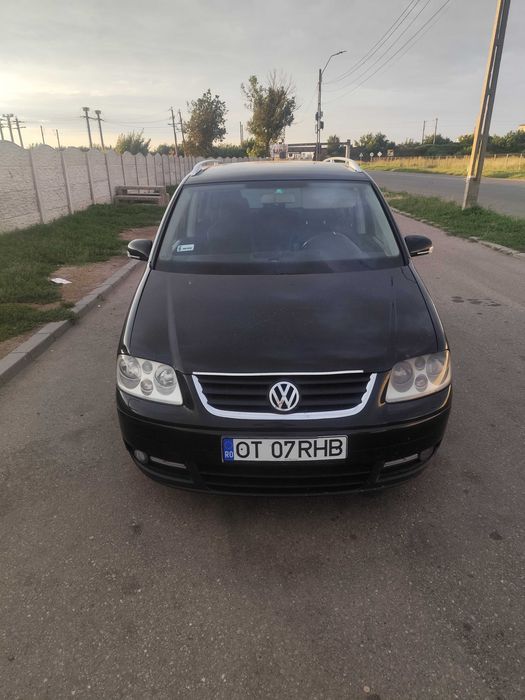 Vw Touran 2003 investit în el 2000 de euro stare de funcționare perfecta 2800 de euro