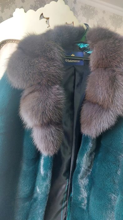 Продам норкавая шуба новый