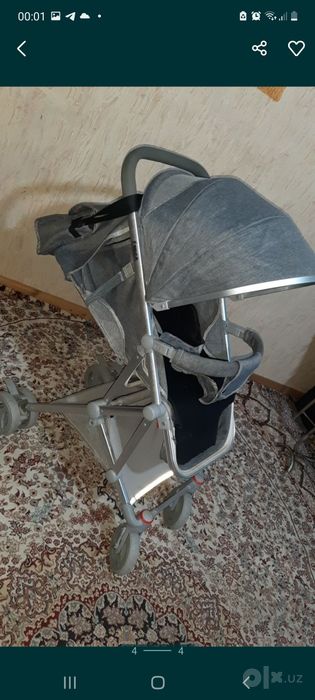 Продам коляску лёгкую и дождевик