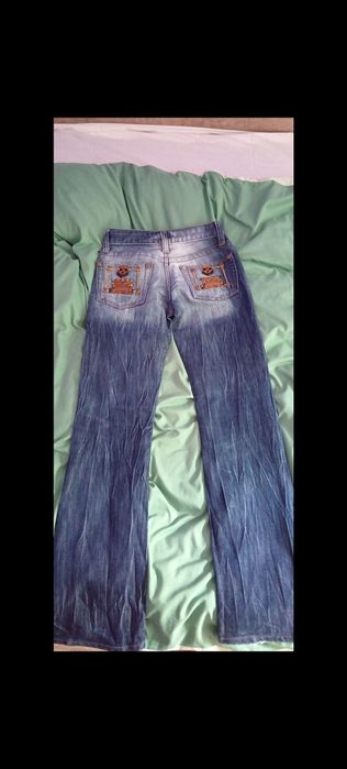 Skinny jeans DSQUARED2 
Se potrivesc unui S probabil
