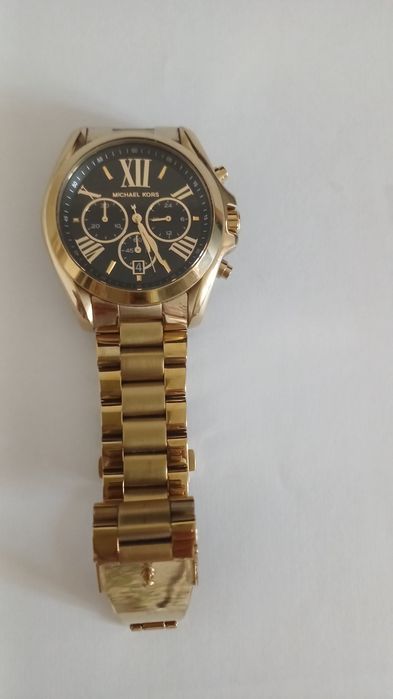 Продам срочно фирменные часы майкол корс