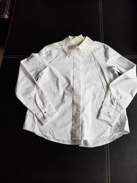 Нова риза на RESERVED