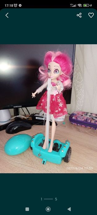 Кукла на гироскутере
