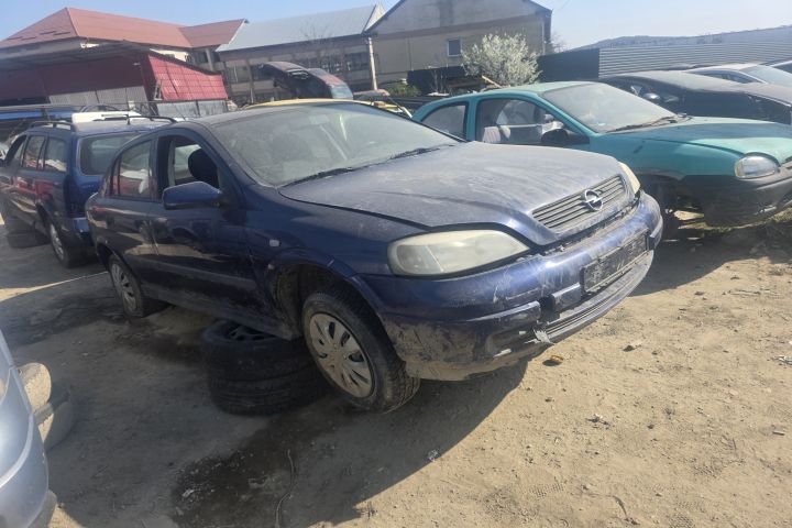 Far stanga Opel Astra 2003 1.4 MT (90 hp)