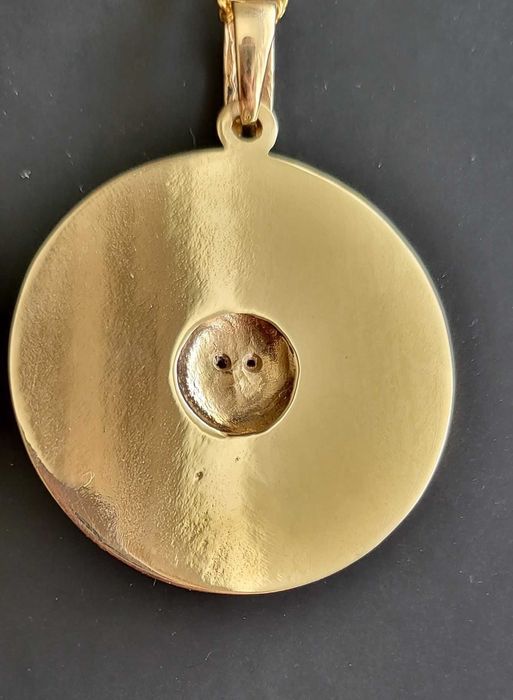 Уникален златен амулет