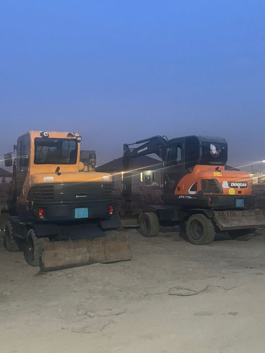 Услуги колёсный экскаватор 140