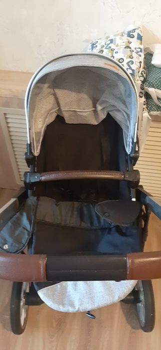 Продам коляску и стульчик