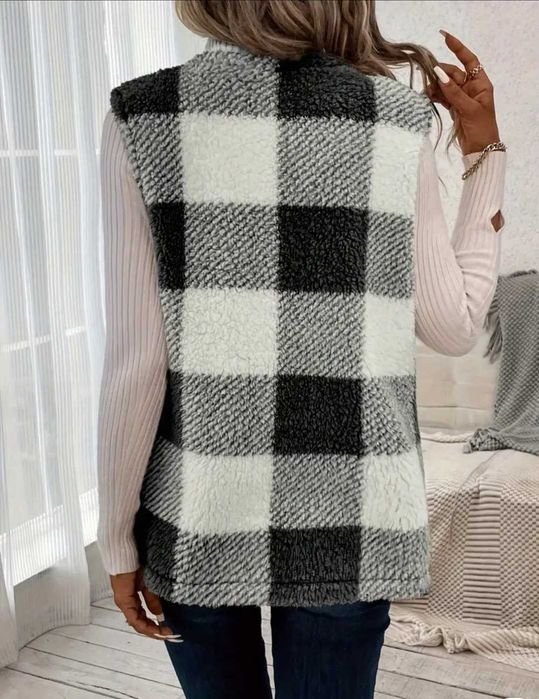 Елегантен дамски пухен елек