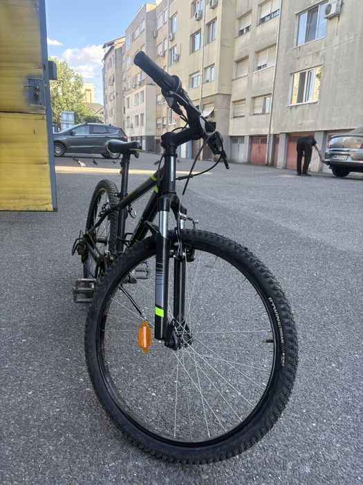 Vand bicicleta Rockrider 7-12 ani pe 24