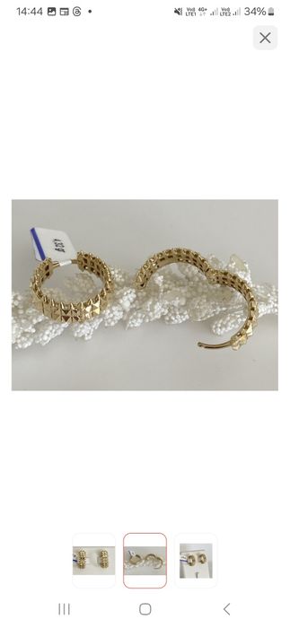 Золотые серьги продам