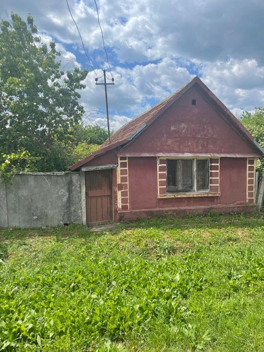 Casa teren de vanzare