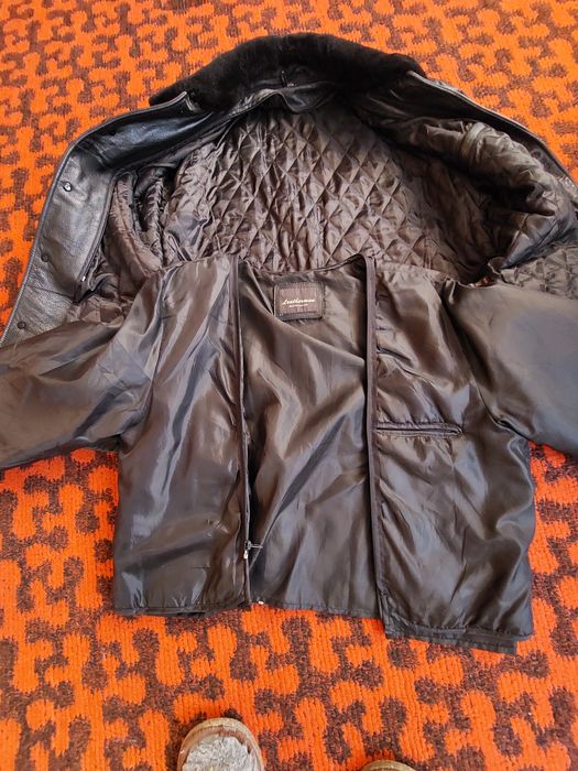 Кожаная куртка .