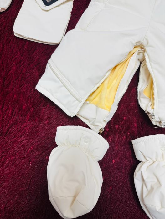 Продам зимний комбинезон Prada