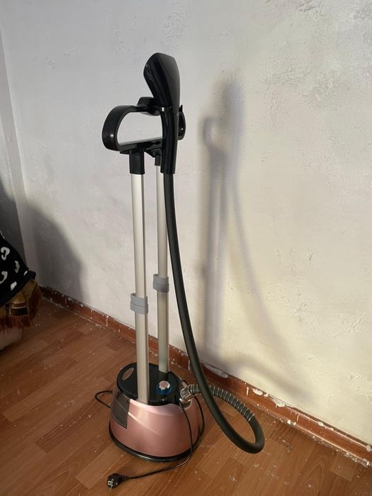 Отпариватель паровой утюг.