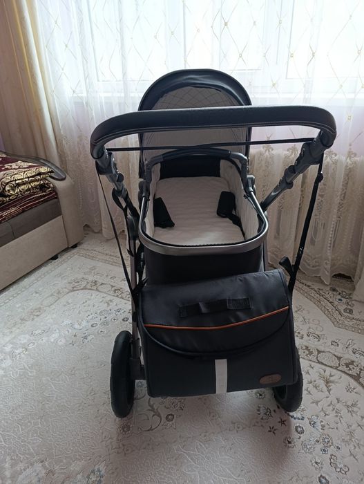 Детская коляска с сумкой