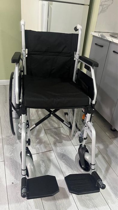 Инвалидная коляска