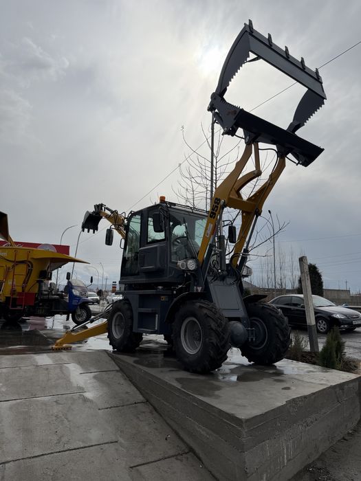 Экскаватор погрузчик 2026