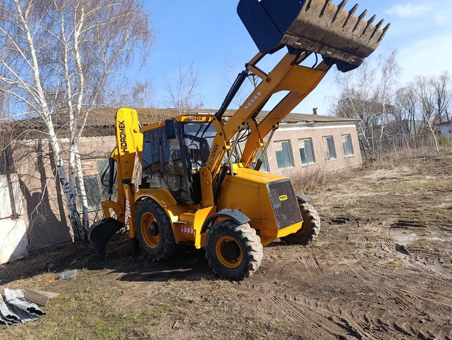 Продам экскаватор погрузчик