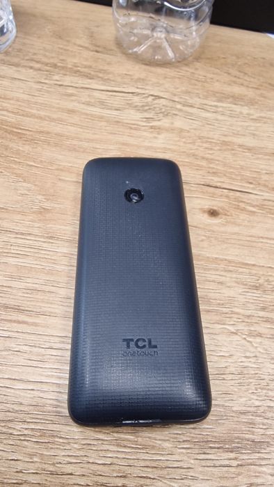 Телефон с копчета TCL