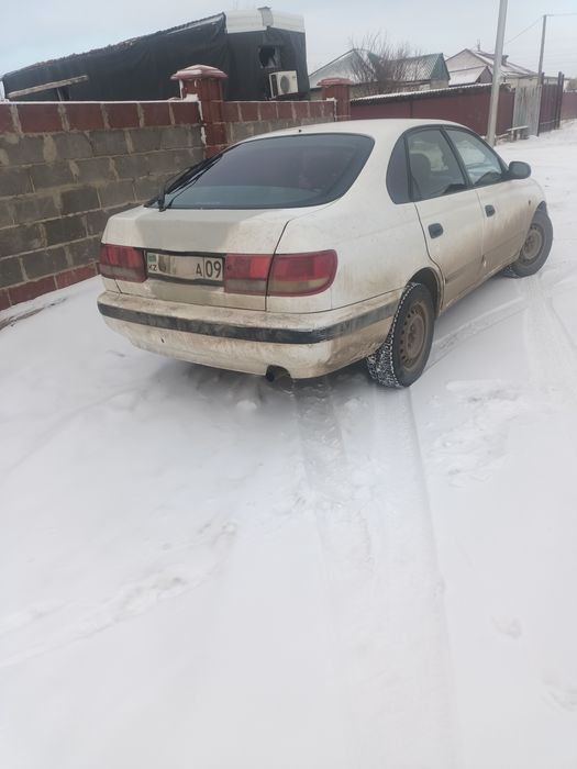 Продам  тойоту карина е