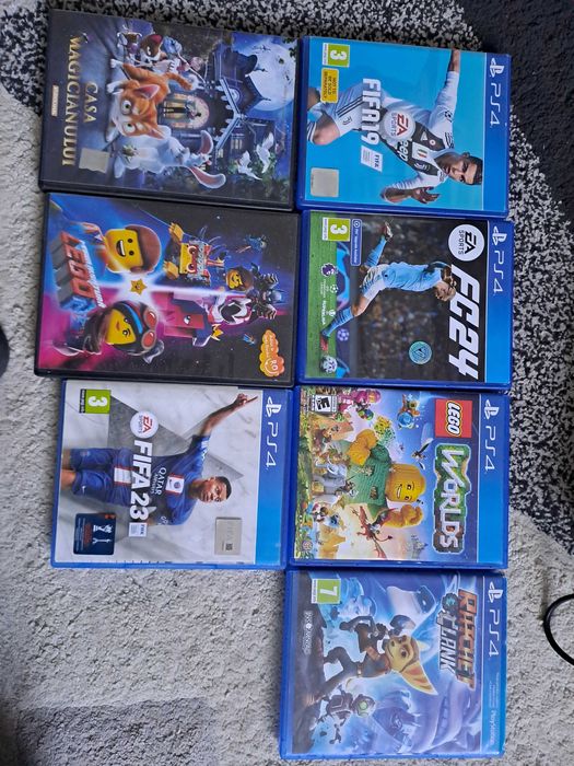 Ps4 cu cateva jocuri. Fifa 19,24 si alte+ 2 manete