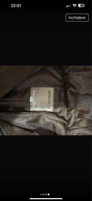 Palton piele naturala captusit cu insertii de blana naturala.