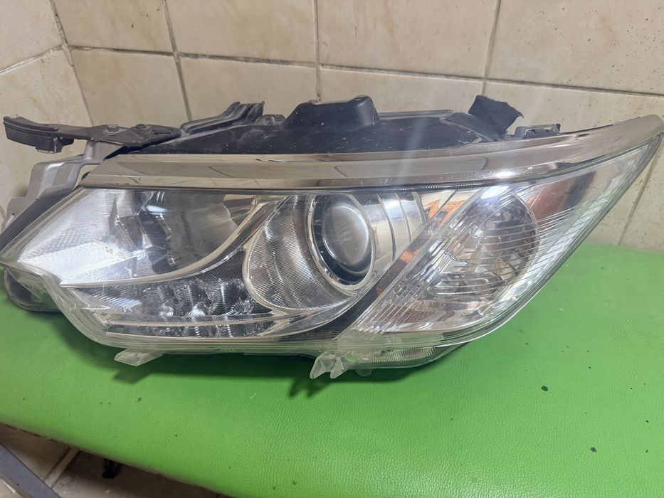 Фара Tayota 55 оригинал левая сторона