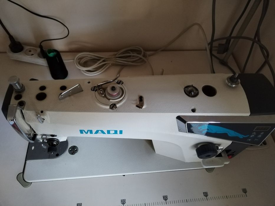 tikyv mashinasi MAQI bir chok yangidek  holatda