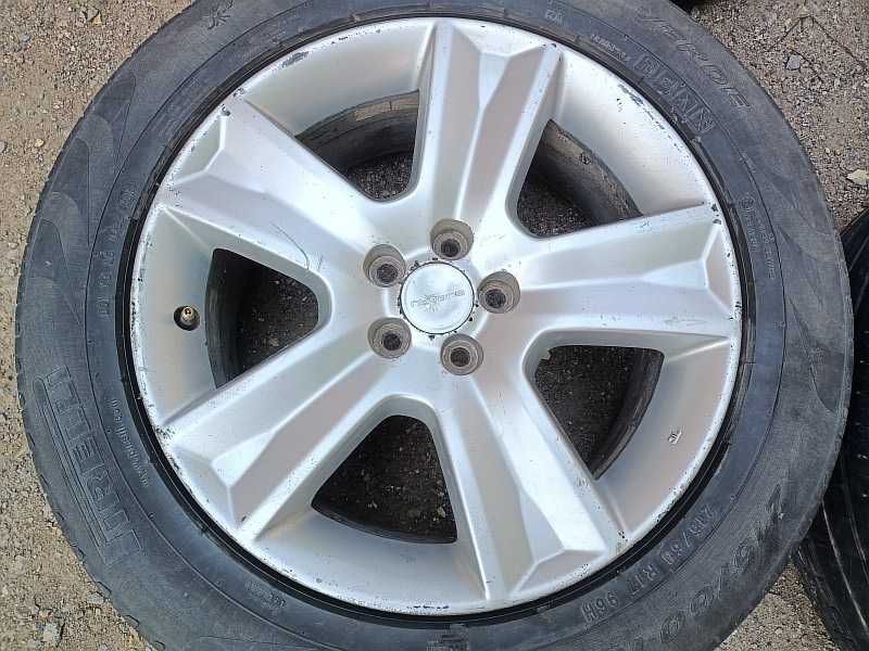 Продам оригинальные легкосплавные диски на Subaru