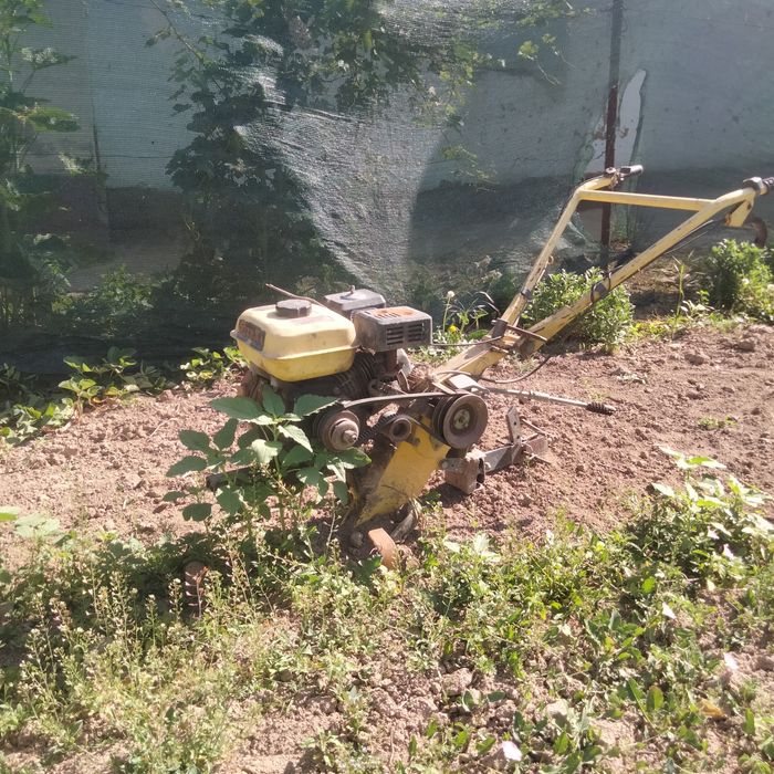 Жер аударатын трактор