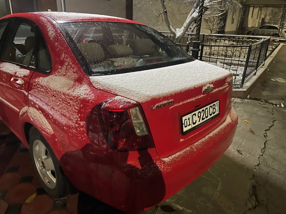 Gentra yili 2015 qizil rang