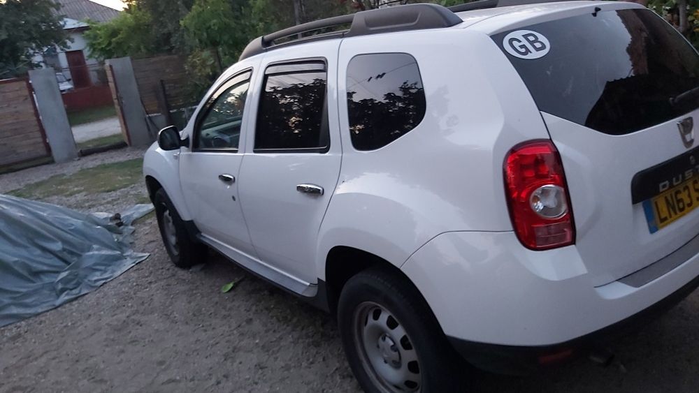 Dezmembrez Dacia duster 1,6 2x4 2013 5 trepte alb