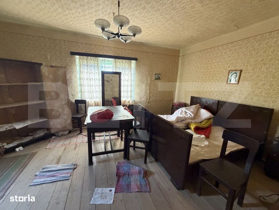 Casa cu 3 camere si un teren in suprafata de 1900 mp