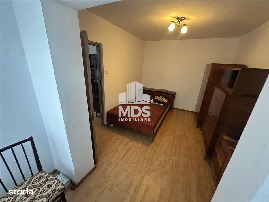 2 camere cu centrala proprie si balcon — fotografia 1