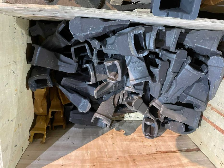 Зубья,адаптеры,фиксаторы,коронки