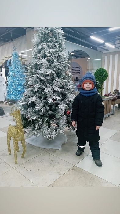 Продам зимний пуховик для мальчика