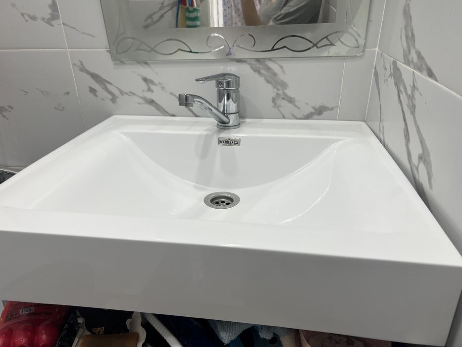 Раковина Қолжуғыш