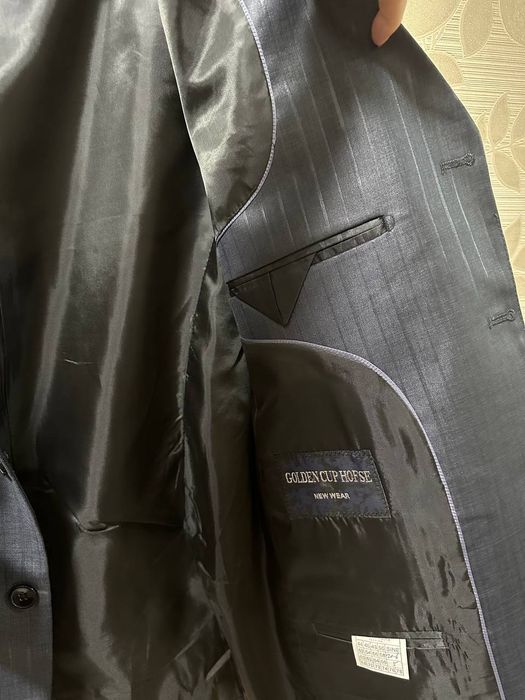 Продам костюм тройка серого цвета.