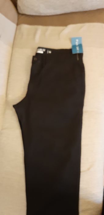 Брюки черные мужские.36 размер.Нам подарили.Ошиблись с размером.