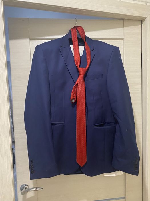 Продается  костюм в отличном состоянии