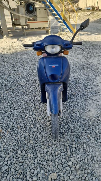 Aprilia  scarabeo 49cc si Honda Deauville 650cc v-twin