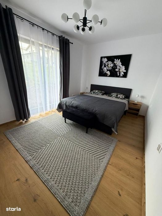 Casa 4 camere,2bai, 700 mp teren,mobilată si utilată