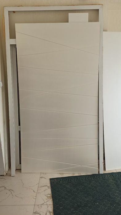 Обшивка для железной двери. Установка замков покраска.