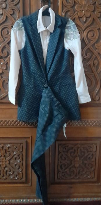 Аёл к,излар кастюмчиклари