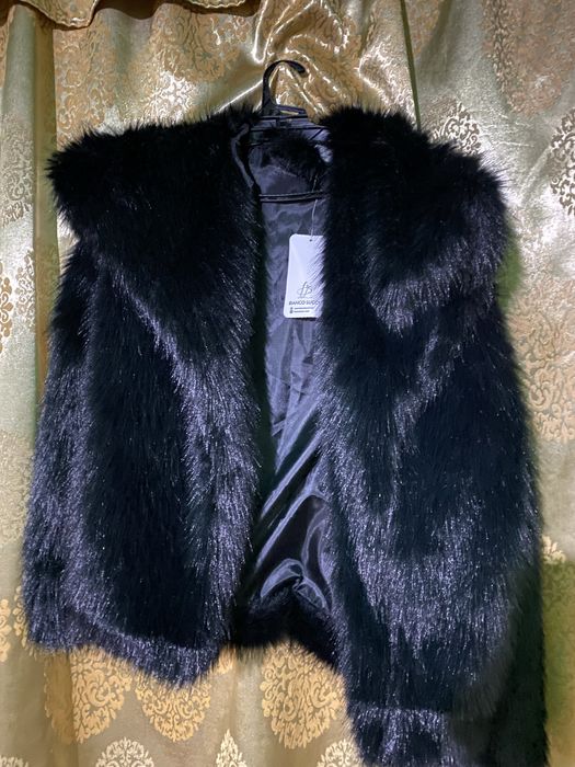 geaca de blana neagra