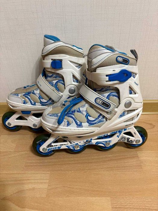 Роликовые коньки раздвижные.