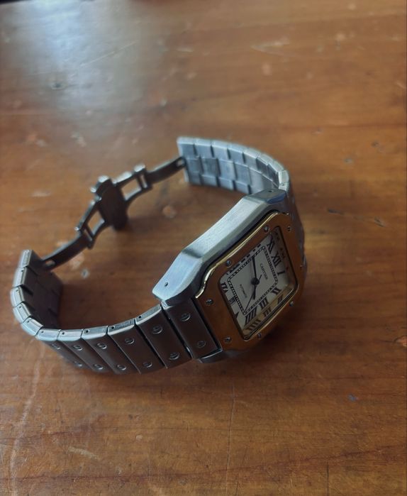 Часы от бренда CARTIER